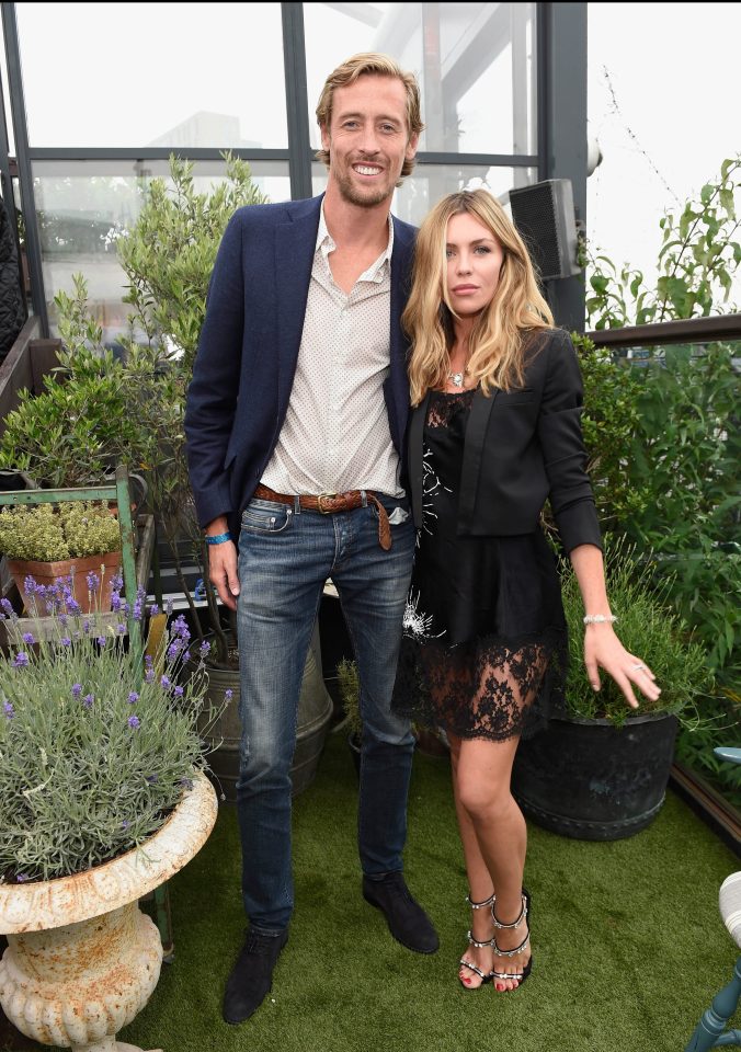  Her footballer husband Peter Crouch, 35, stayed home where he was playing a pre-season friendly