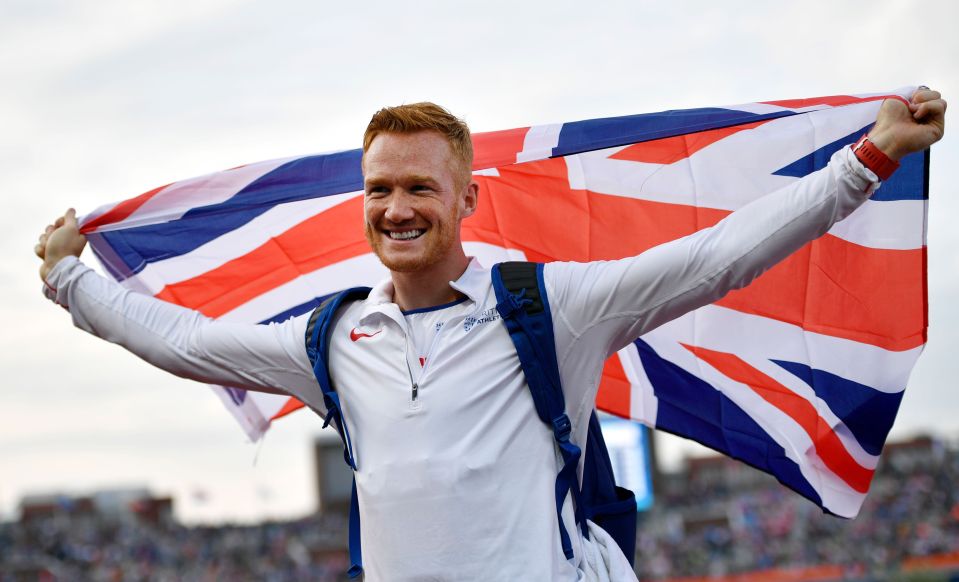  Greg Rutherford celebrates gold medal by waving Union Jack in Amsterdam