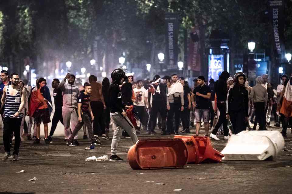  French hooligans caused havoc on the Champs Elysees in Paris yesterday