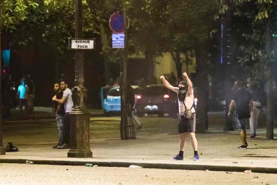  Yobs pelted police with rocks and fireworks after France beat Germany to book their place in the final