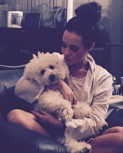  After the celebrations, she also shared a new picture of herself cuddling her dog