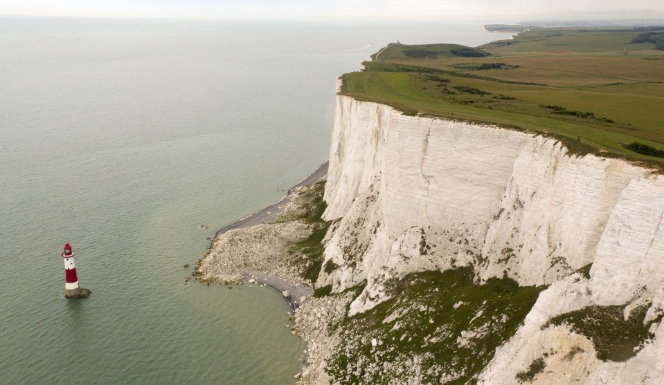  Nearly 1,000 walkers gathered to catch a glimpse of Beachy Head Lighthouse