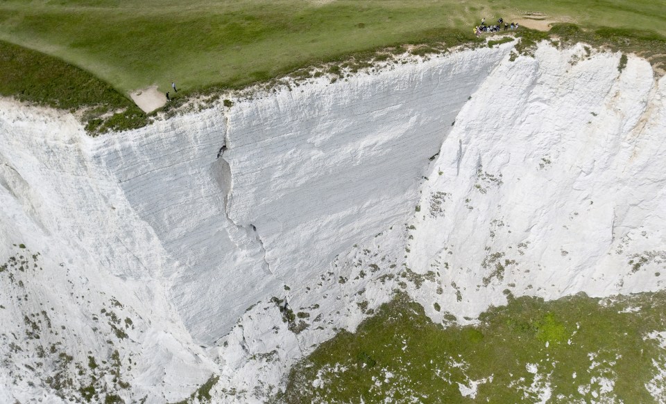  Aerial shots show a huge crack in the cliff face at Beachy Head