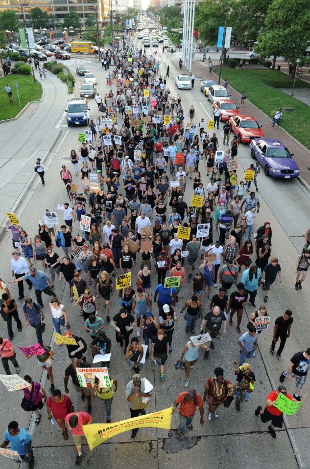  Activists towards Baltimore Police headquarters on Friday