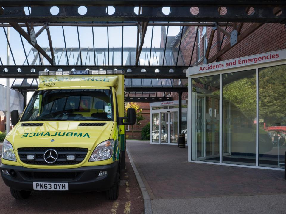 Ambulance queuing outside Accident and Emergency Department Wigan Infirmary