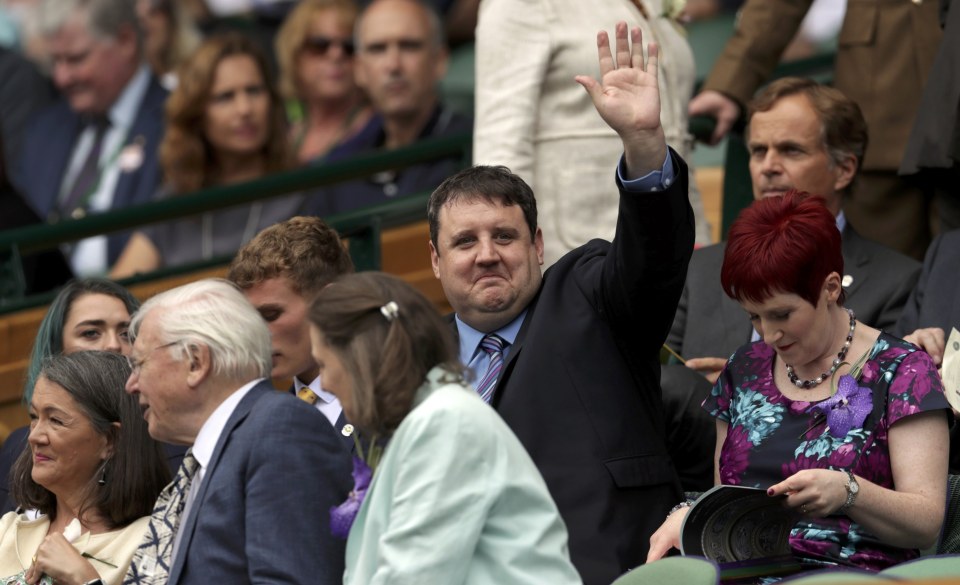  Peter Kay gives the crowd a wave