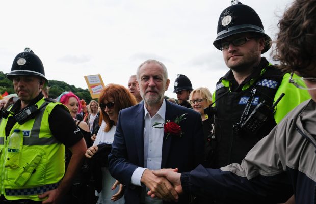 Jeremy Corbyn escorted by police