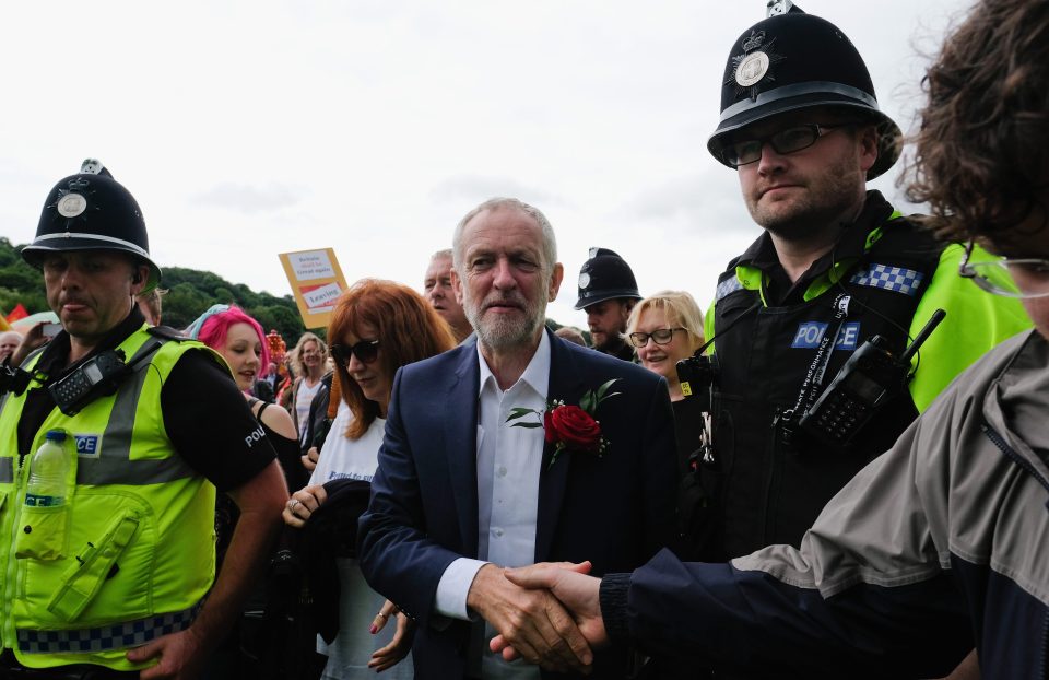  Jeremy Corbyn is often escorted by police officers at big public events