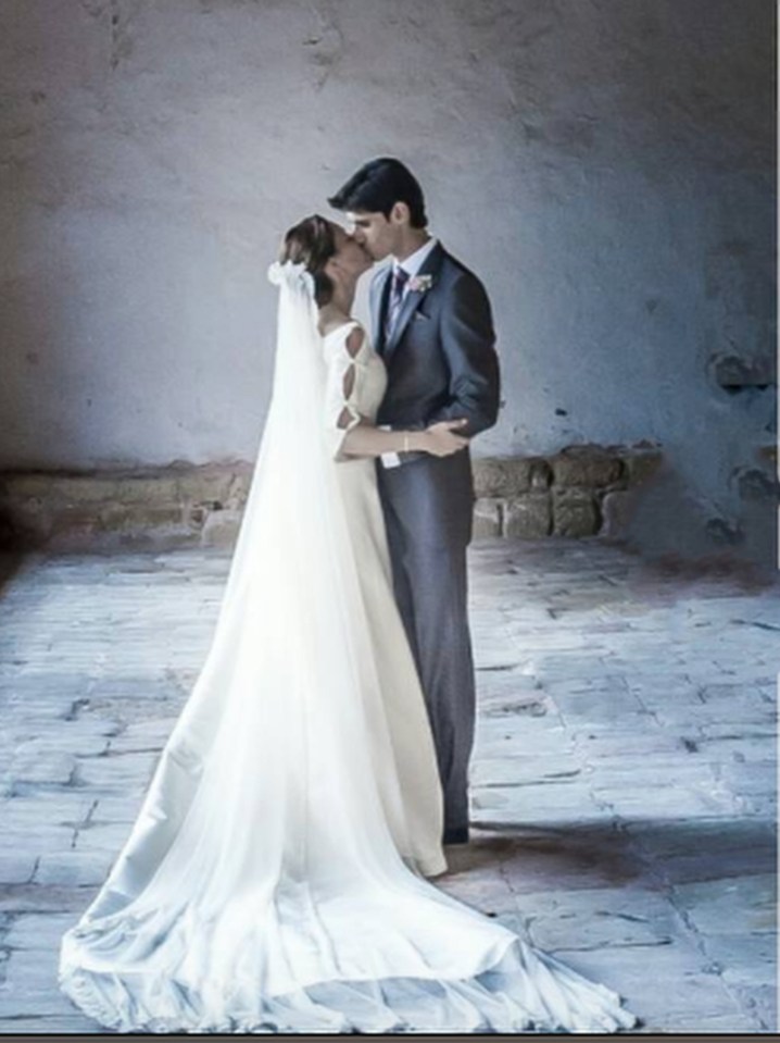  Barrio and his wife Raquel, who watched him die at the hands of a bull, posing for their wedding photo