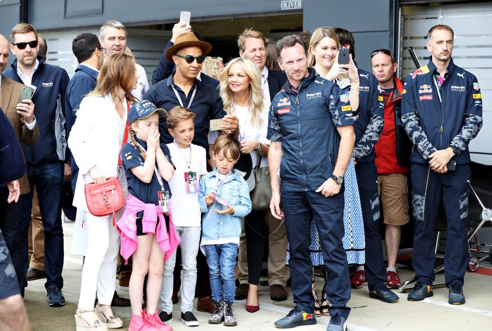  They all looked like they were enjoying a fun family day out at the Grand Prix at Silverstone