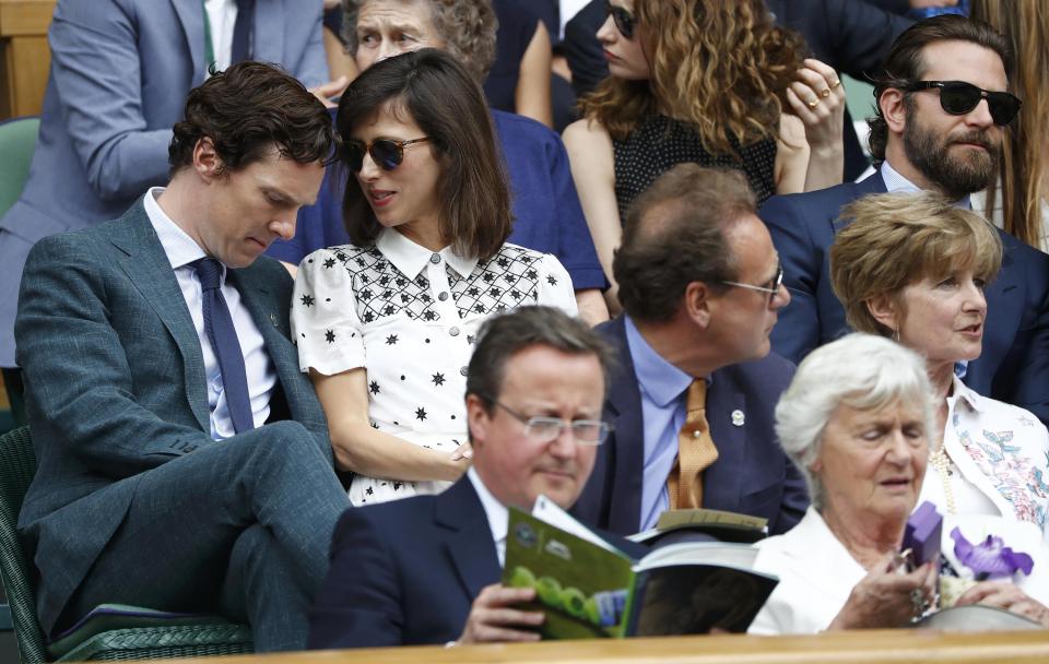  Benedict and Sophie shared a quiet word while Cameron read his programme