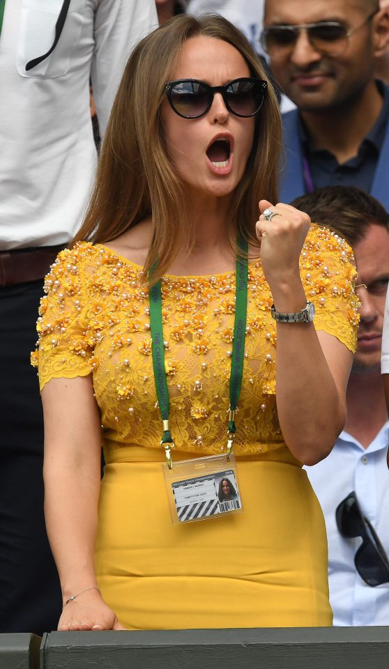  Kim Murray cheers on husband Andy from the stands at Wimbledon