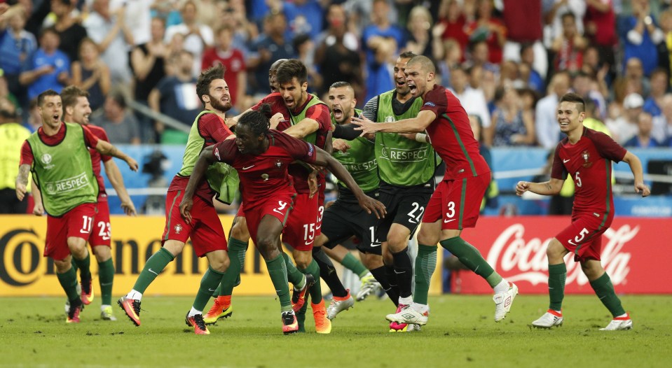 The Portugal players rush to celebrate with Eder after his brilliant extra-time goal gave them the lead against Portugal