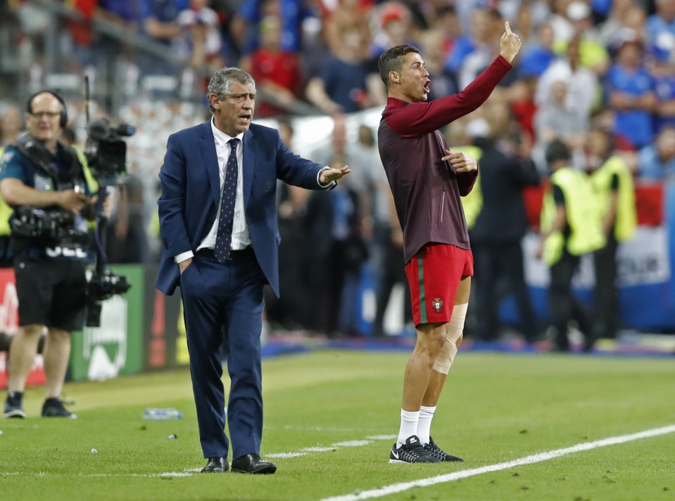  Cristiano Ronaldo gives instructions to Portugal players from sidelines during Euro final