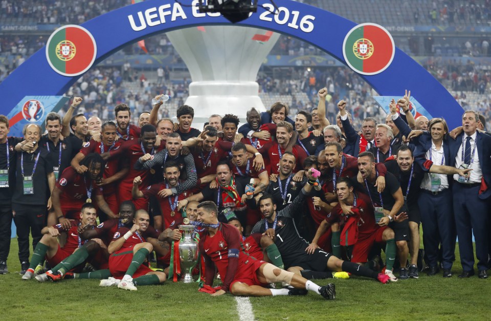  The Portugal side celebrate their shock Euro 2016 victory over France