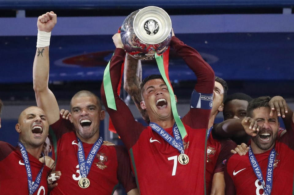  Portugal captain Cristiano Ronaldo lifts the cup after his team-mates win final