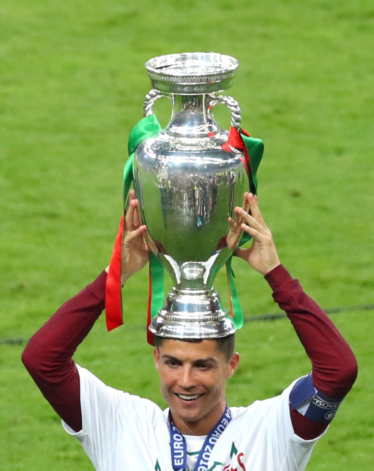  Cristiano Ronaldo lifts the European cup - but he does not feature in Opta's best XI