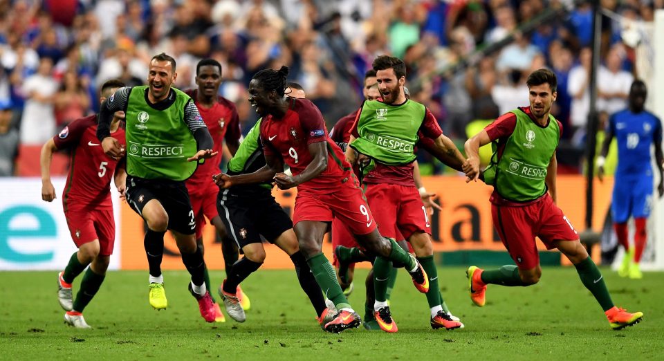  Portugal mob match-winner Eder after his 109th minute clincher against  France