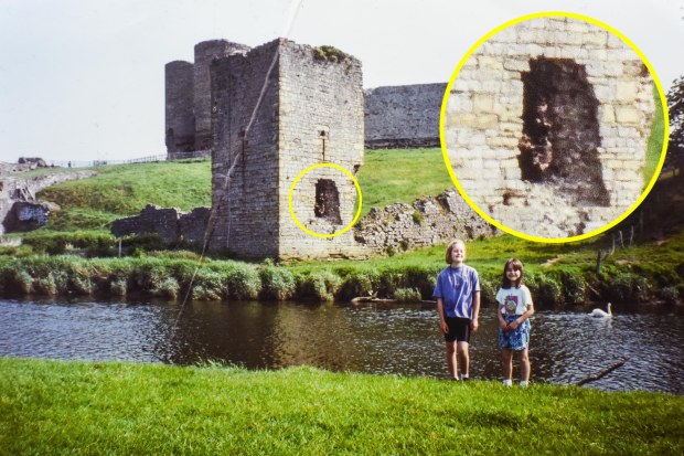 Has a granddad captured an image of a ghostly archer in the background of an old family photo?