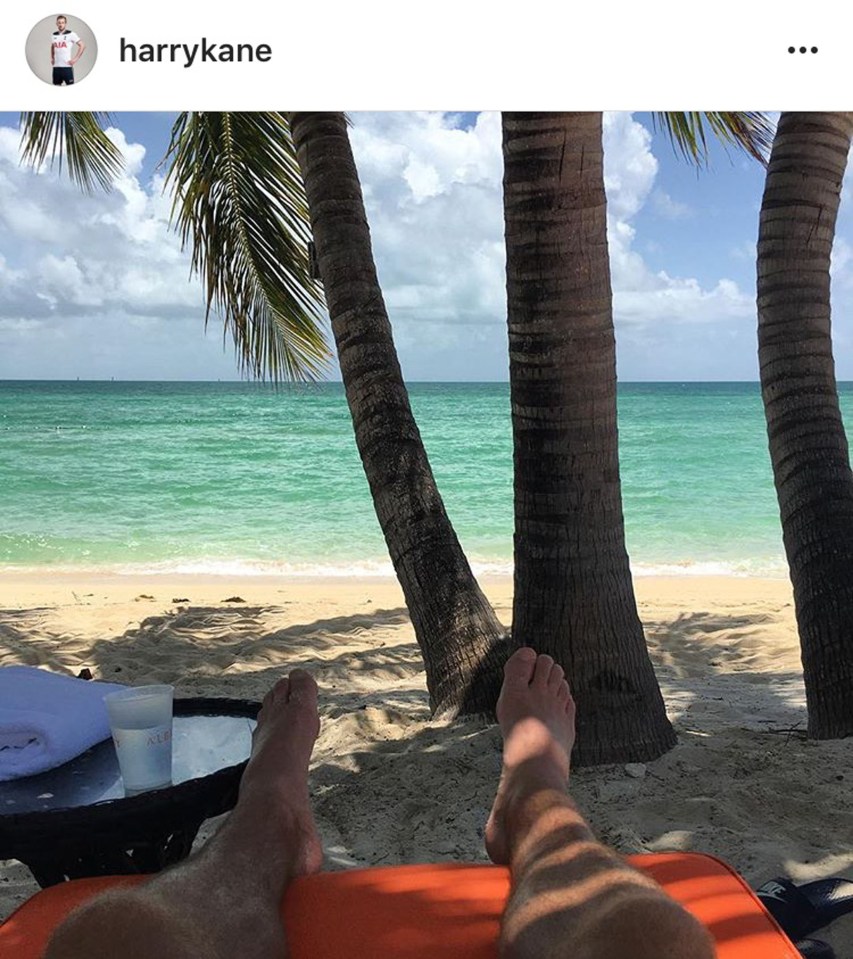  Kane snapped himself sunbathing on a tropical beach