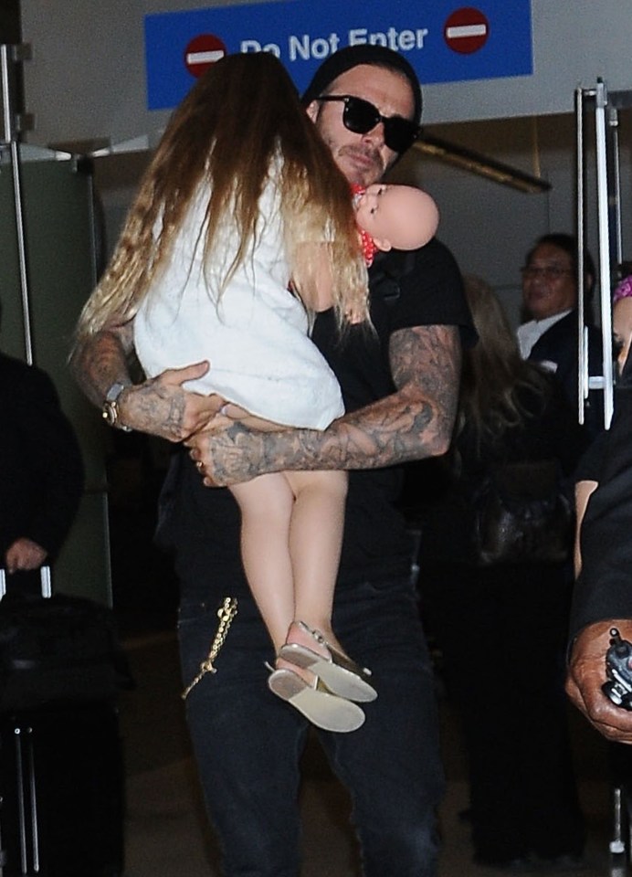 FAMEFLYNET - David Beckham And Kids Arriving On A Flight At LAX Airport