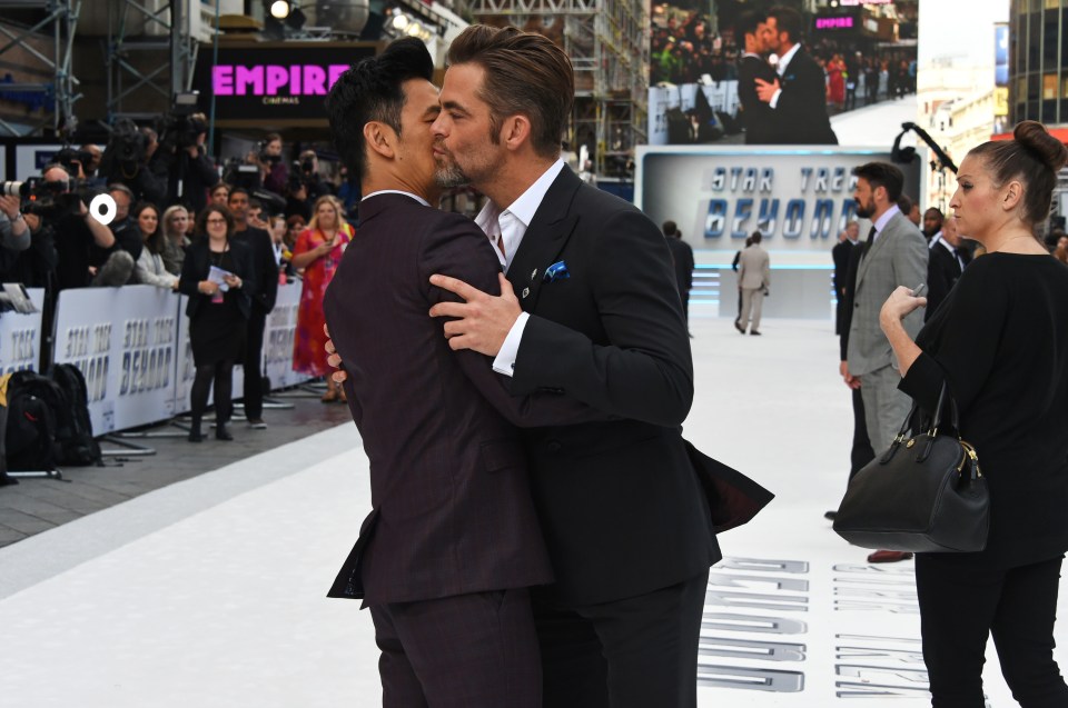  His co-star John Cho was also treated to a kiss on the cheek as they greeted each other on the red carpet