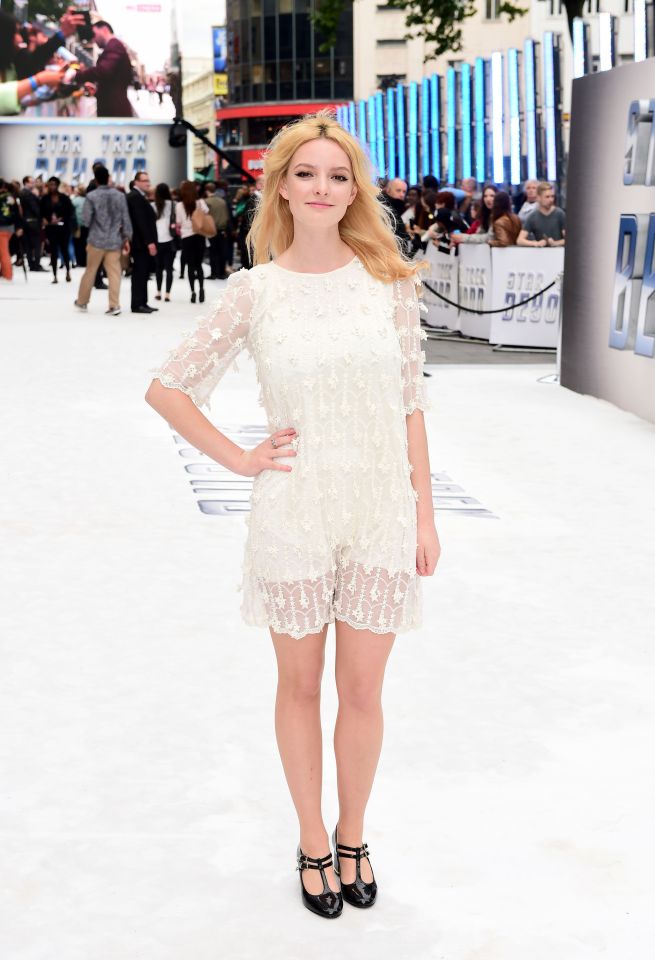  Dakota Blue Richards looked stunning in a lovely white mini dress