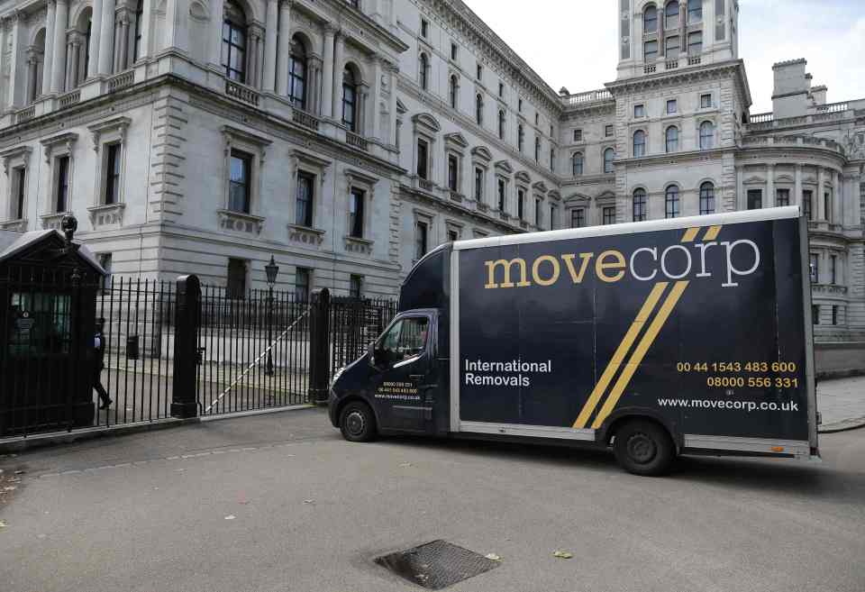  Theresa May's moving men pull up to Downing Street