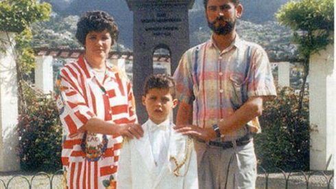  A young Ronaldo, pictured with his parents