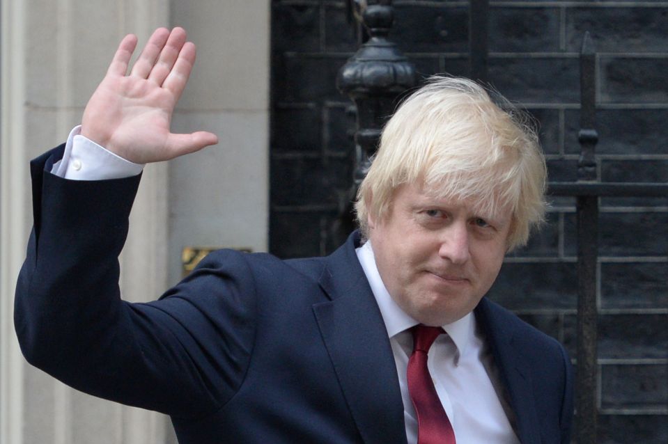  Newly appointed Foreign Secretary Boris Johnson waves as he leaves 10 Downing Street but does not stop to speak to reporters