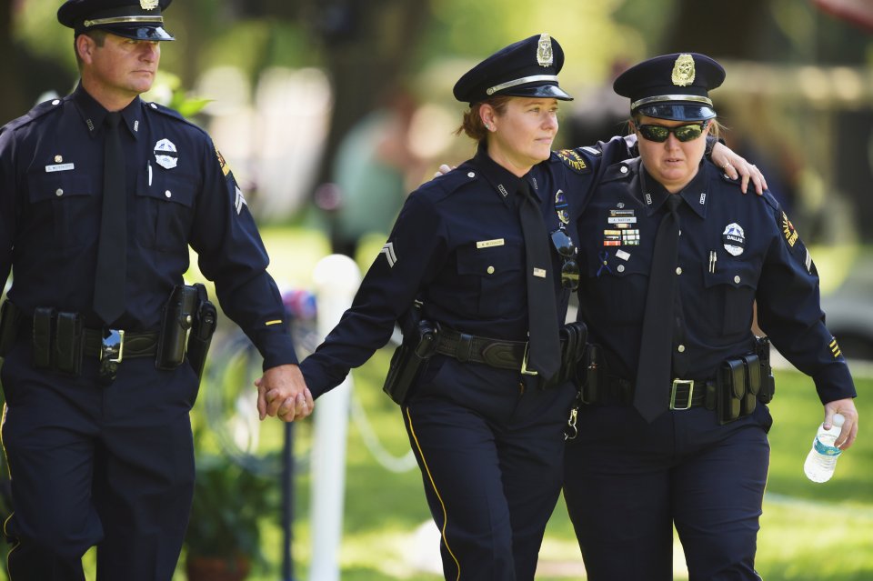  Emotional former colleagues leave the burial ceremony of the tragic policeman