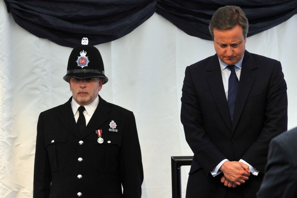  David Cameron stood in silence to honour the two PCs murdered by Dale Cregan