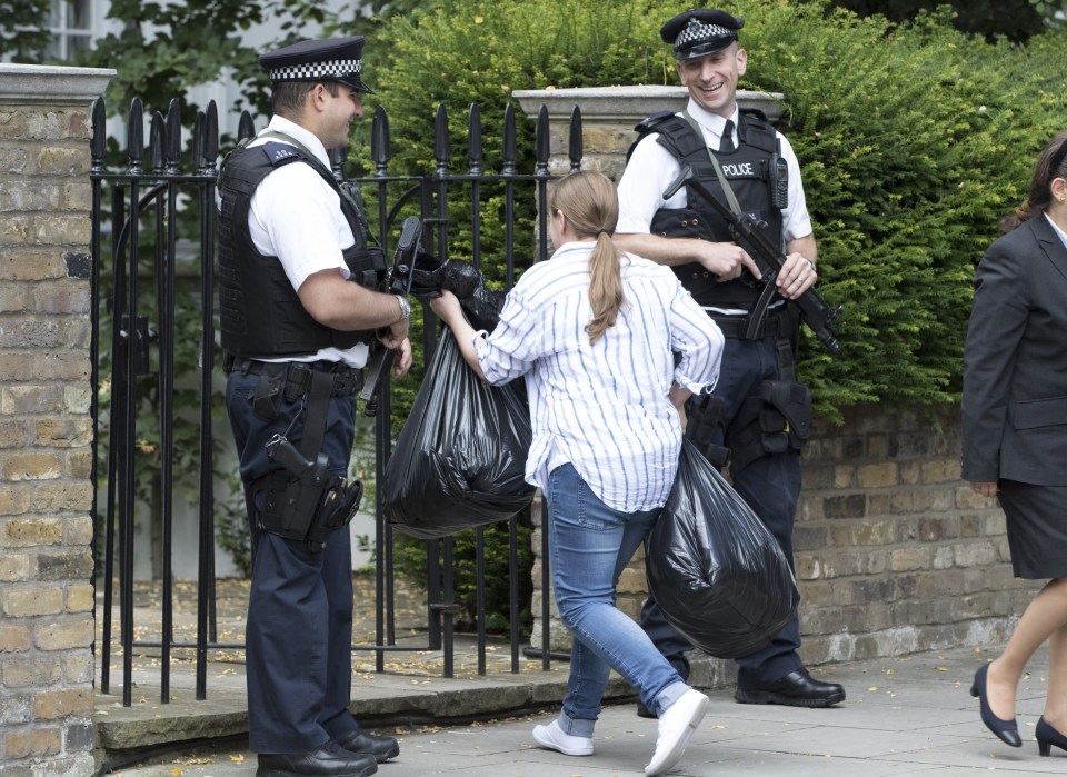  Bags arriving with family's possessions