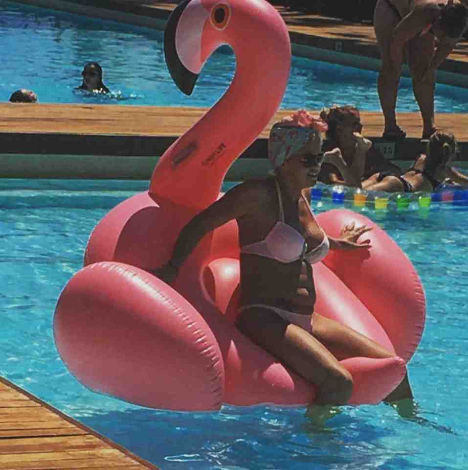  The actress looked toned, tanned and very relaxed as she slid from the inflatable into the pool