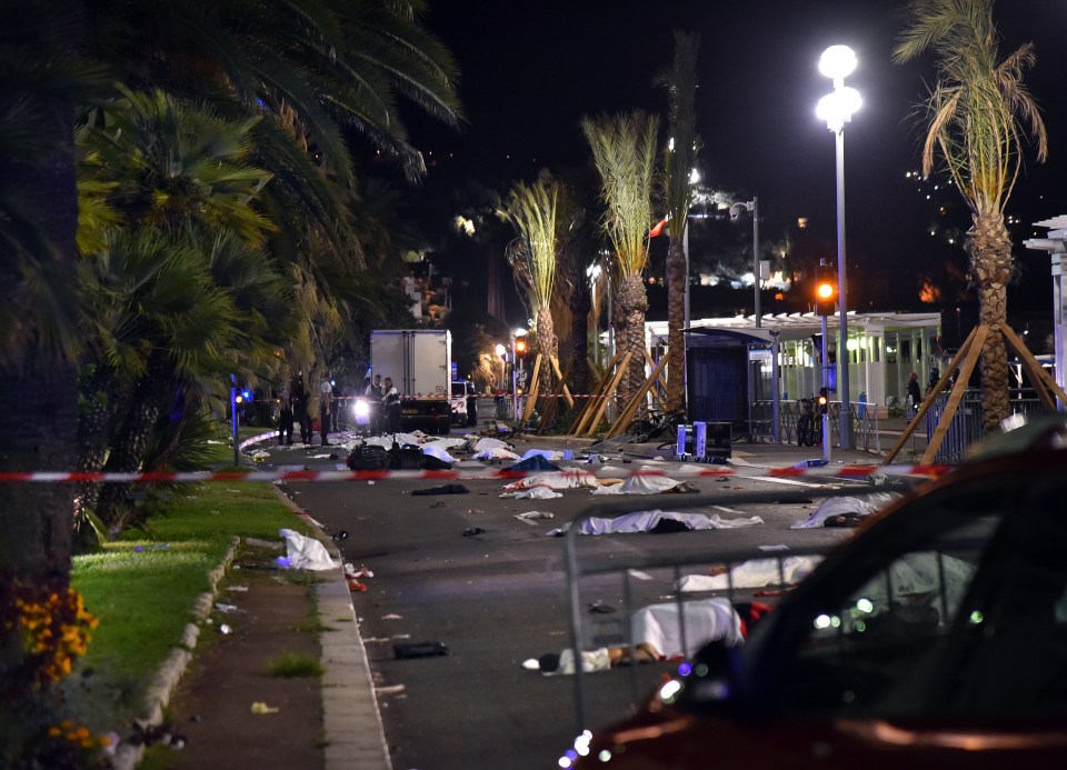  Dead bodies are littered along the promenade in Nice after the devastating attack