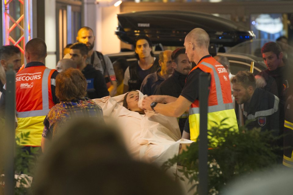  A victim is treated by paramedics after the horror attack on Nice's main promenade