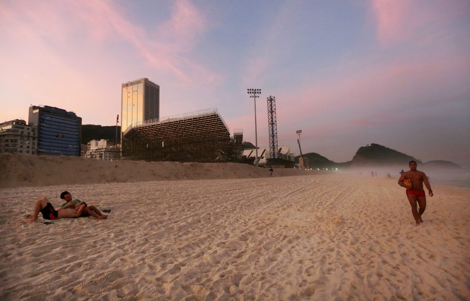  Preparations are underway for the beach volleyball competition on Copacabana beach which is just along the coast from where the adult movie was filmed