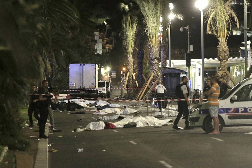  Horror... bodies litter the ground after a truck driver shouting 'allahu akbar' ploughed through crowds celebrating Bastille Day in Nice