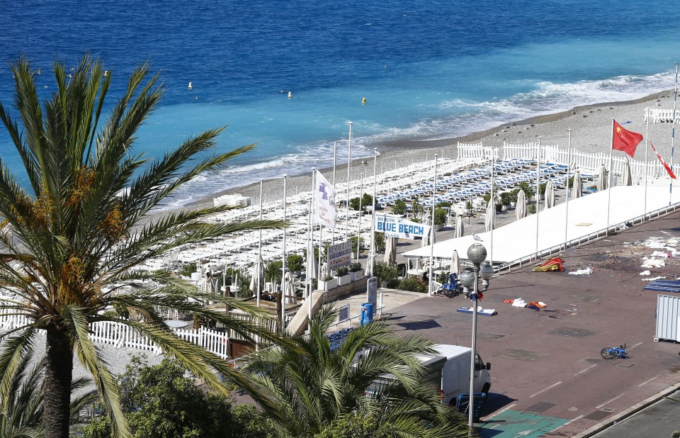  Belongings are left strewn along the stretch of promenade in Nice the morning after the atrocity