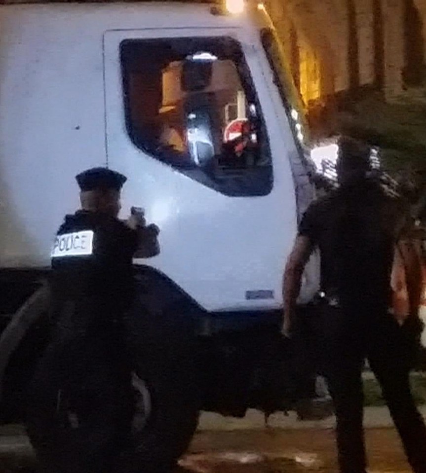  Brave police shoot the driver of the lorry who had just killed scores of revellers at a Bastille Day celebration in Nice