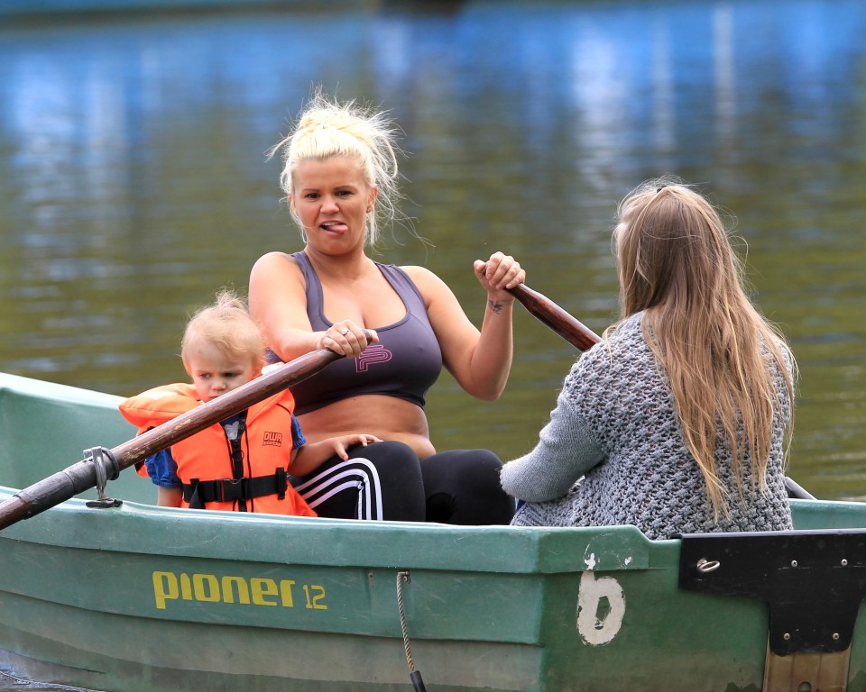 Kerry was seen sticking out her tongue as she rowed the boat