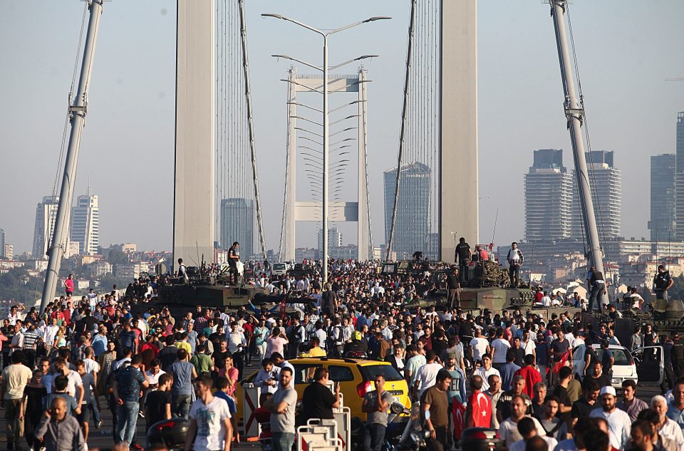  People have gathered to celebrate the end of the coup..but the president has warned them to be prepared for more violence