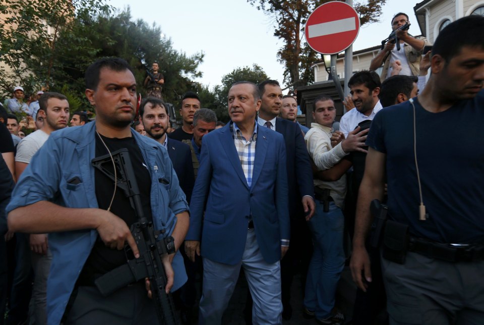  Turkish President Recep Tayyip Erdogan (centre) has rounded up thousands of soldiers and opponents after the clashes in Ankara