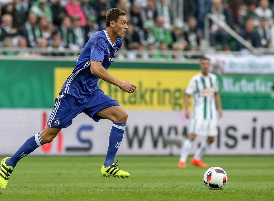  Chelsea midfielder Nemanja Vidic strides across the pitch at Allianz Stadion