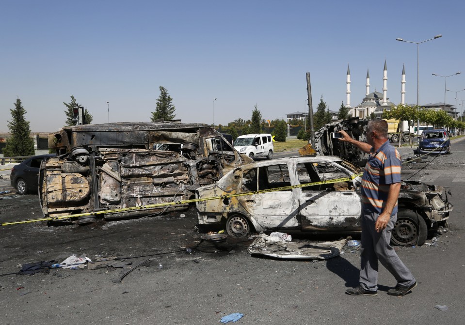  Burnt out and destroyed vehicles litter the streets following the failed coup in Turkey, which has left at least 265 people dead