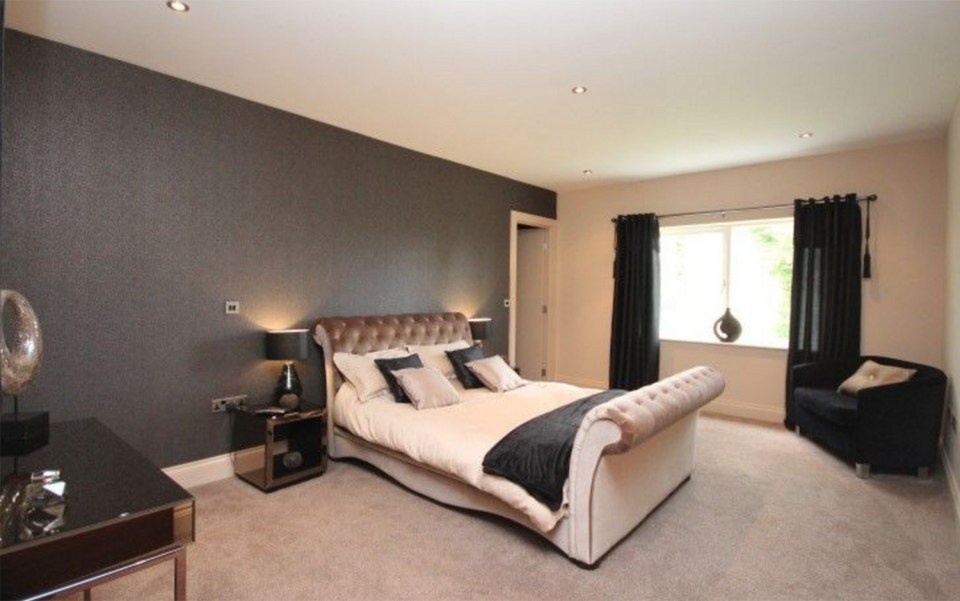  Another bedroom which has a mix of dark and cream colours