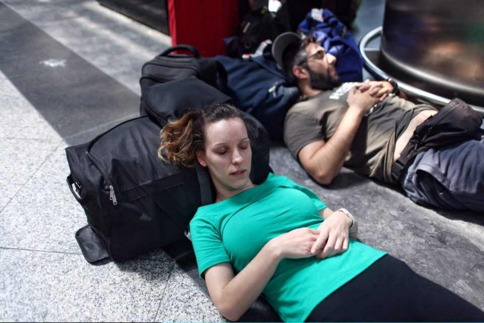  Argyro Gountsiou from Melbourne, Australia rests as she waits her flight in Ataturk Airport in Istanbul