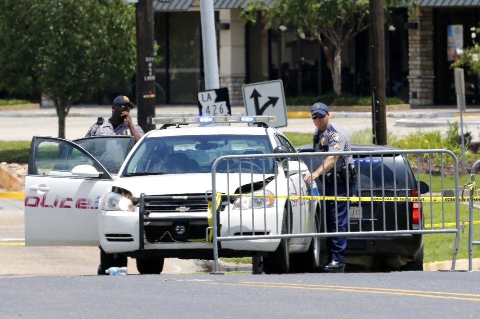  A woman spotted the gunman behind a B-Quik store on Airline Highway