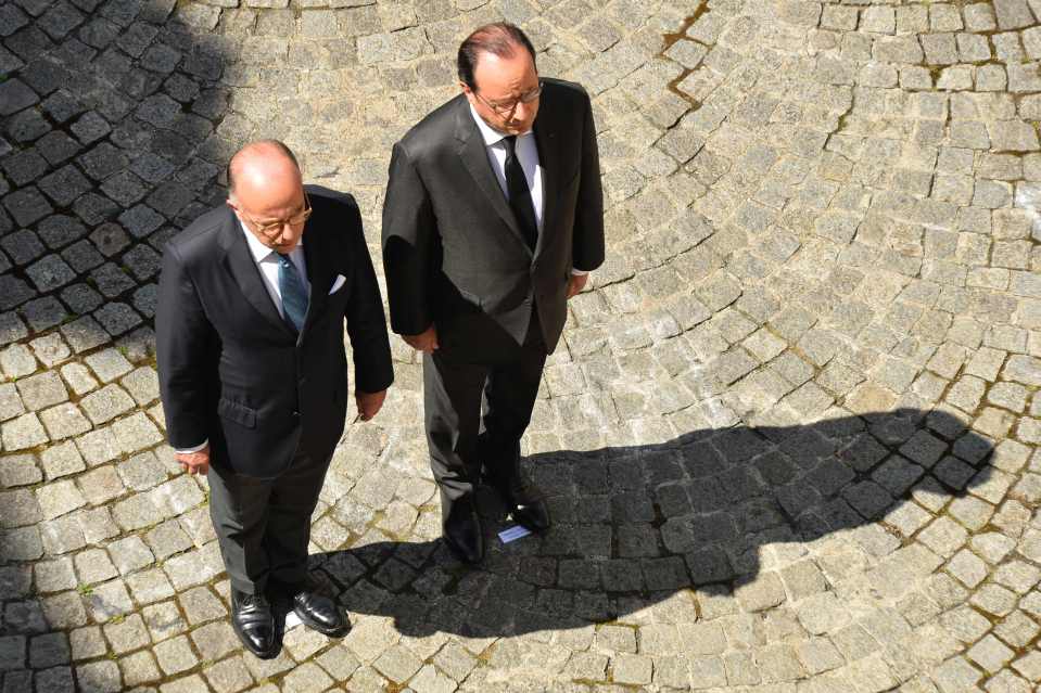  French President Francois Hollande and French Interior Minister Bernard Cazeneuve (left) pay tribute to the Bastille Day massacre victims