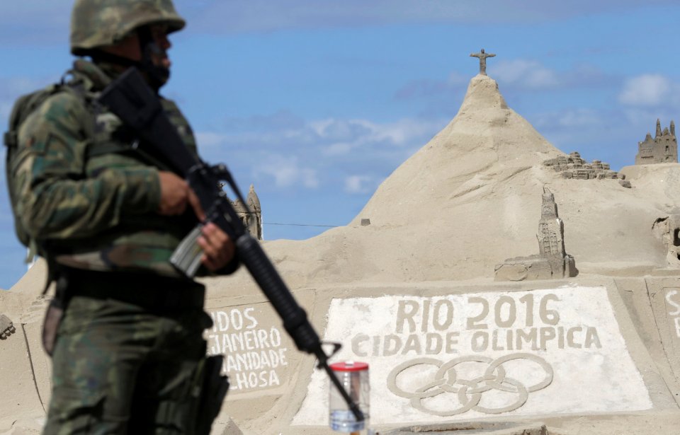  Brazilian Army Forces soldiers patrol Copacabana beach ahead of the Olympics